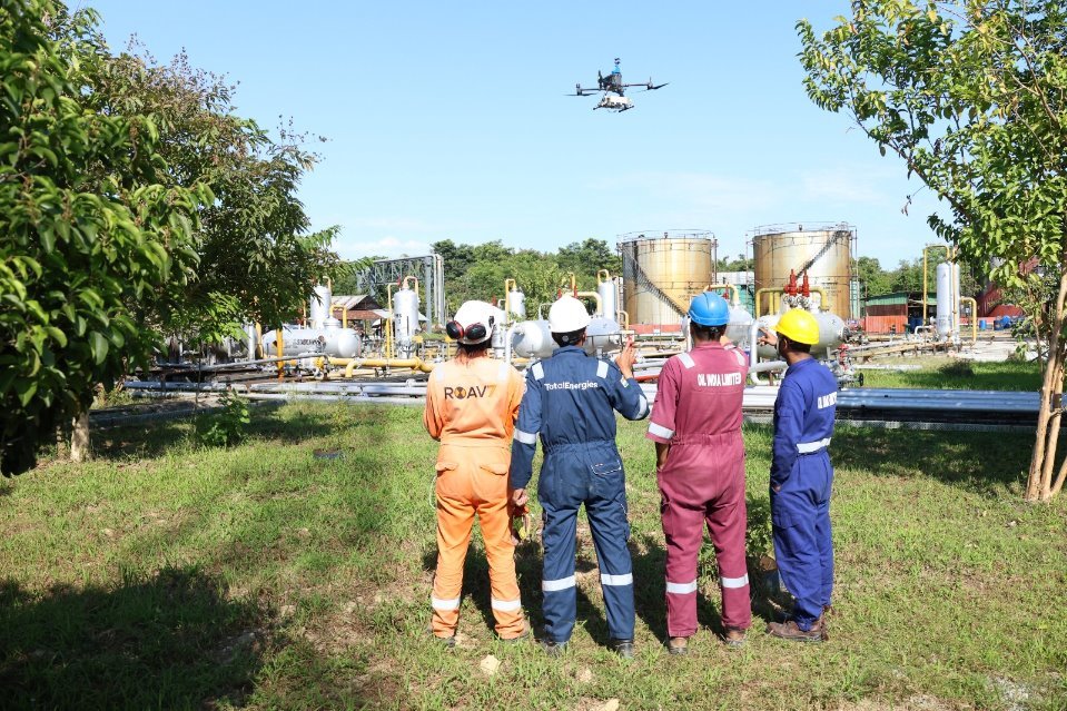 Team observing AUSEA drone over facility